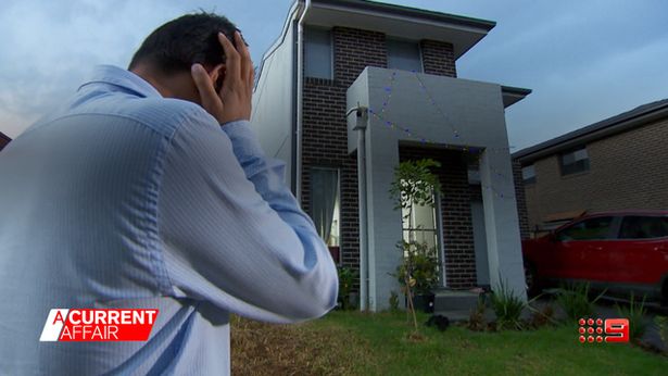 Mr Aryal outside his home