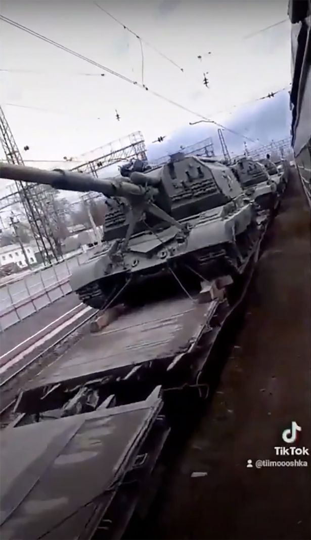 Russian tanks on the move as an expert said 'half a million' troops are being deployed