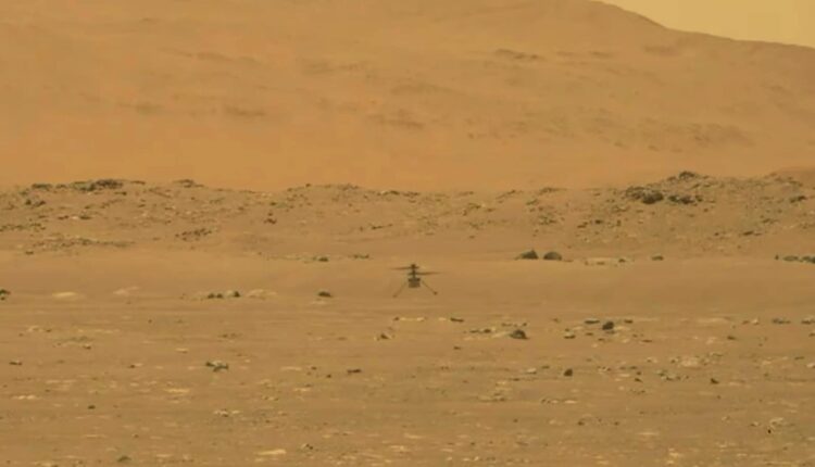 In a first, Nasa's Ingenuity helicopter makes history with flight on Mars
