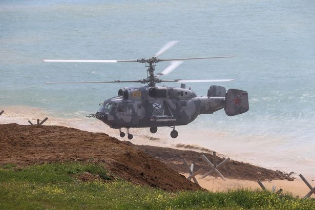 A Russian Kamov Ka-29 helicopter takes part in a military drill along the Opuk training ground not far from the town of Kerch, on the Kerch Peninsula in the east of the Crimea