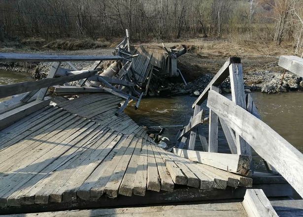 The newly built bridge collapsed under the Lexus