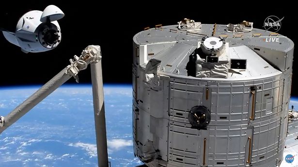 The SpaceX's Crew Dragon spacecraft at 20 metres of the docking access of the International Space Station