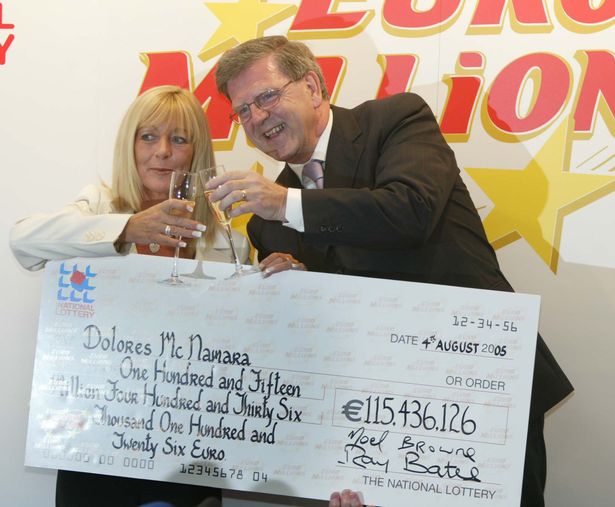 Dolores McNamara picks up her cheque for €115 million