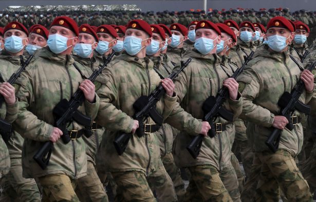 Russian servicemen marching on Friday at a Victory Day rehearsal