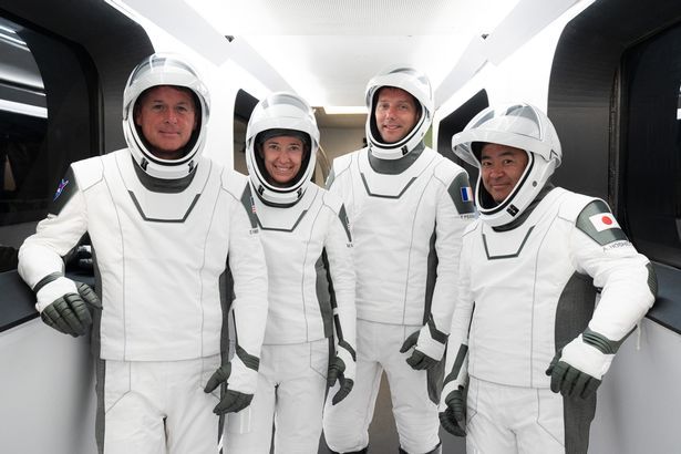 NASA astronauts Megan McArthur and Shane Kimbrough, European Space Agency's Thomas Pesquet, and Japan Aerospace Exploration Agency's Akihiko Hoshide