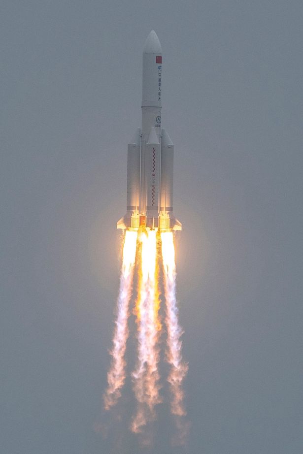 A Long March 5B rocket, carrying China's Tianhe space station core module, lifts off from the Wenchang Space Launch Center