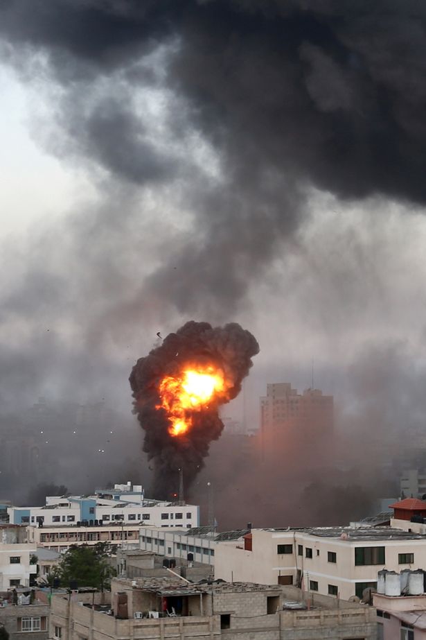 Smoke and flames rise during Israeli air strikes amid a flare-up of Israeli-Palestinian violence in Gaza