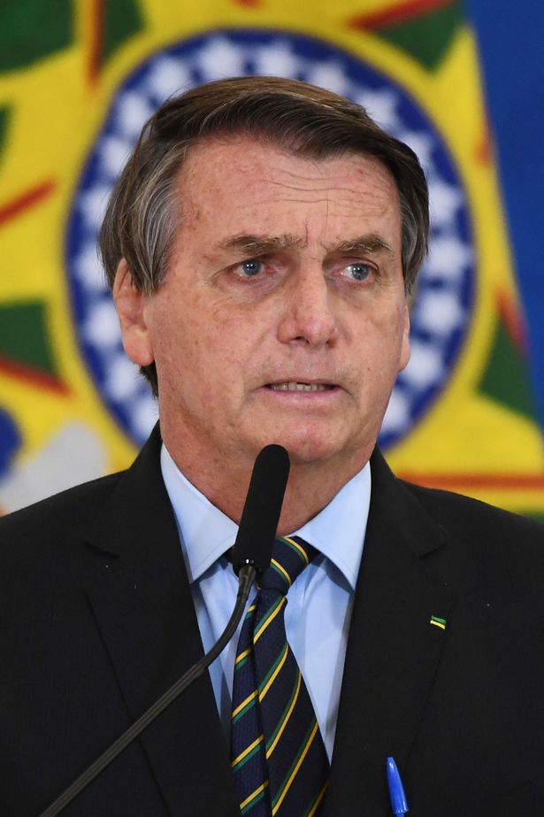 Brazilian President Jair Bolsonaro speaks after the country's Covid death toll passes 300,000 in March 2021