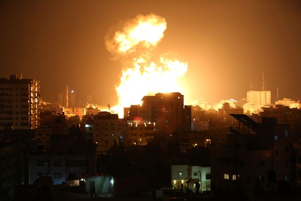 Smoke and flames rise after Israeli fighter jets conducted airstrikes in Gaza City