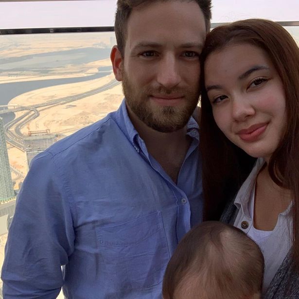 Caroline Crouch and Charalambos Anagnostopoulos with their baby daughter