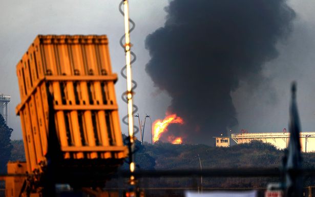 Fire raging early on May 12 at Ashkelon's refinery, which was hit by Hamas rockets the previous day