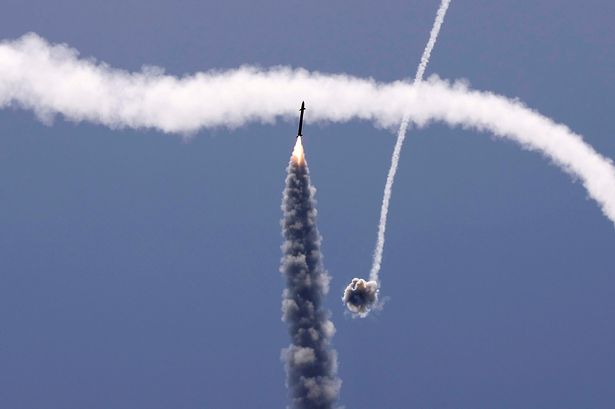 Israel's Iron Dome aerial defence system intercepts a rocket launched from the Gaza Strip, controlled by the Palestinian Hamas movement, above the southern Israeli city of Ashkelon