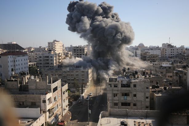 Smoke billows after an Israeli airstrike on Gaza City,