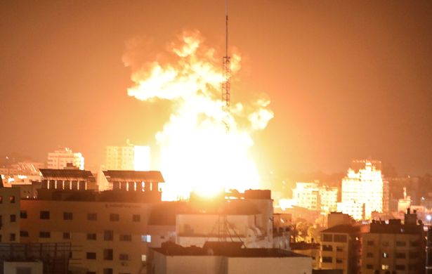 Smokes and flames rise after airstrikes by Israeli army hit buildings in Gaza City