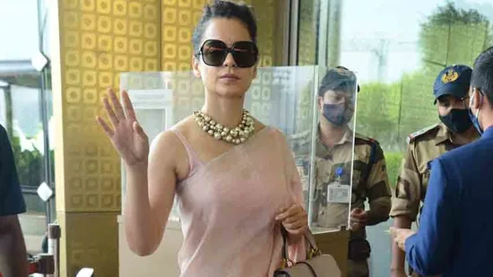 Previously Kangana was seen in a blush pink saree which she paired with a matching blouse, a chunky pearl necklace and a Dior bag.(Instagram)