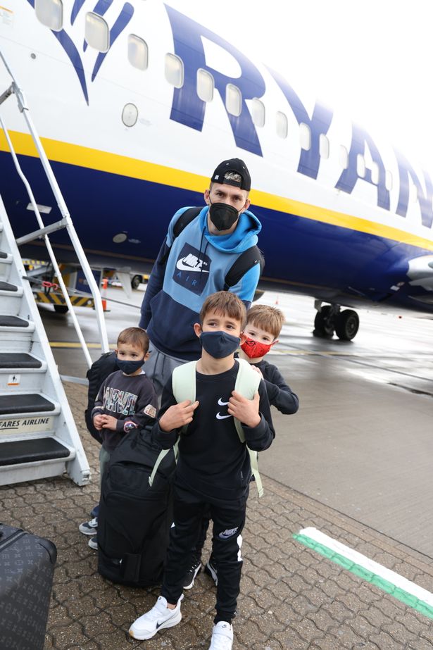 Passengers wait to board their Ryanair flight to Alicante at Stansted Airport as Spain opens its borders to Brit travellers