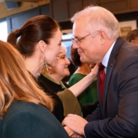 Australian Prime Minister Scott Morrison receives a traditional greeting from New Zealand Prime Minister Jacinda Ardern as he arrives for a welcoming ceremony during his visit in Queenstown on Sunday.  | VISITS AND CEREMONIAL OFFICE NEW ZEALAND / VIA AFP-JIJI