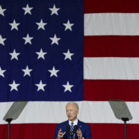 U.S. President Joe Biden delivers remarks to service members at Joint Base Langley-Eustis in Hampton, Virginia, on Friday.  | KENNY HOLSTON/THE NEW YORK TIMES