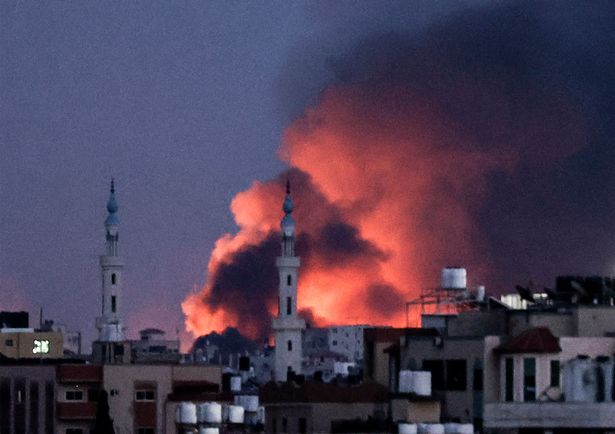 Smoke billows following an Israeli air strike on Gaza City,