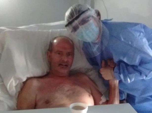 Coronavirus patient Noberto Di Natale(left) with unidentified person in the hospital