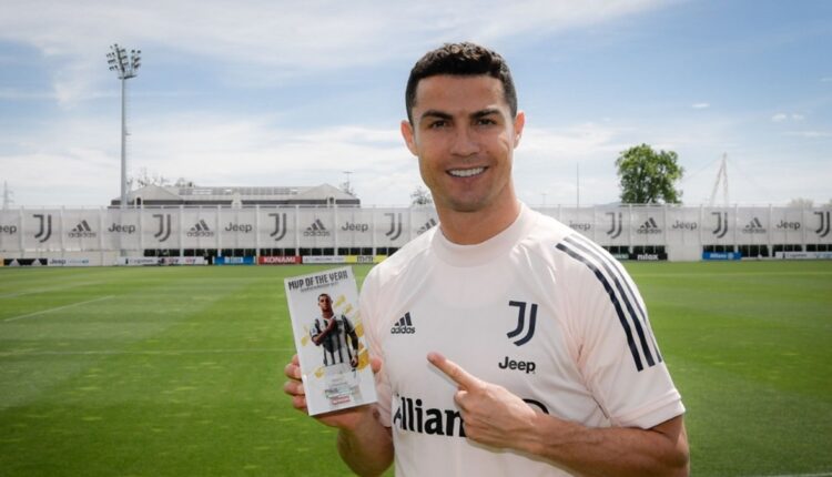 Cristiano Ronaldo Poses With Most Valuable Player of the Year Award Amid Transfer Rumours