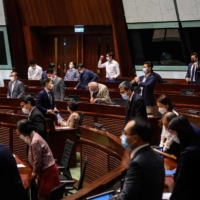 Hong Kong's Legislative Council voted 40-2 to approve measures Thursday creating a review committee to vet candidates for elected office and ensure they’re 'patriots.' | AFP-JIJI