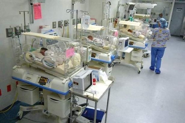 The babies pictured in their incubators