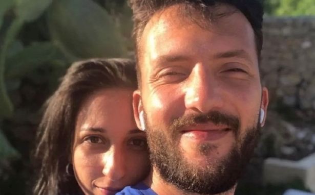 Silvia Malnati and Alessandro Merlo pose for a selfie