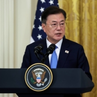 South Korea's President Moon Jae-in holds a joint news conference with U.S. President Joe Biden after a day of meetings at the White House earlier this month. | REUTERS 
