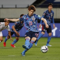 Japan's Yuya Osako scores his second goal against Myanmar on Friday in Chiba. | REUTERS