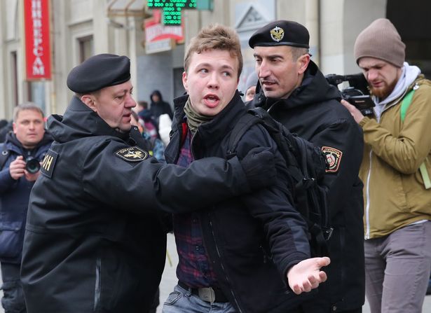 Police officers detain Roman Protasevich attempting to cover a rally in Minsk, Belarus, on 26 March 2017