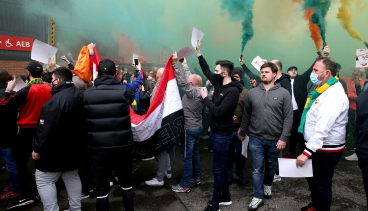 Manchester United's game off after fans storm stadium in protest against club owners