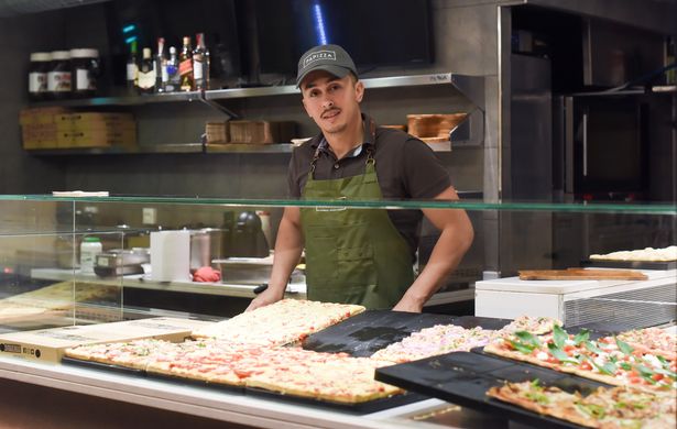 Ricky Perez at his pizza shop, Papizza