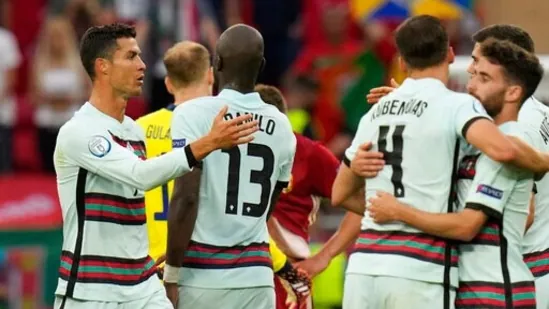 Portugal's Cristiano Ronaldo celebrates at the end of the Euro 2020 soccer championship group F match between Hungary and Portugal at the Ferenc Puskas stadium in Budapest, Hungary Tuesday, June 15, 2021. (AP Photo/Darko Bandic, Pool)(AP)