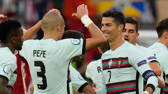 Portugal's Cristiano Ronaldo celebrates with his teammate Pepe.(AP)
