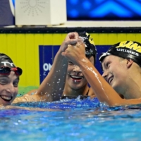 Katie Ledecky (left) reacts with Katie Grimes after winning in women’s 800-meter freestyle finals during the U.S. Olympic Team Trials Swimming competition Saturday in Omaha, Nebraska.  | USA TODAY / VIA REUTERS