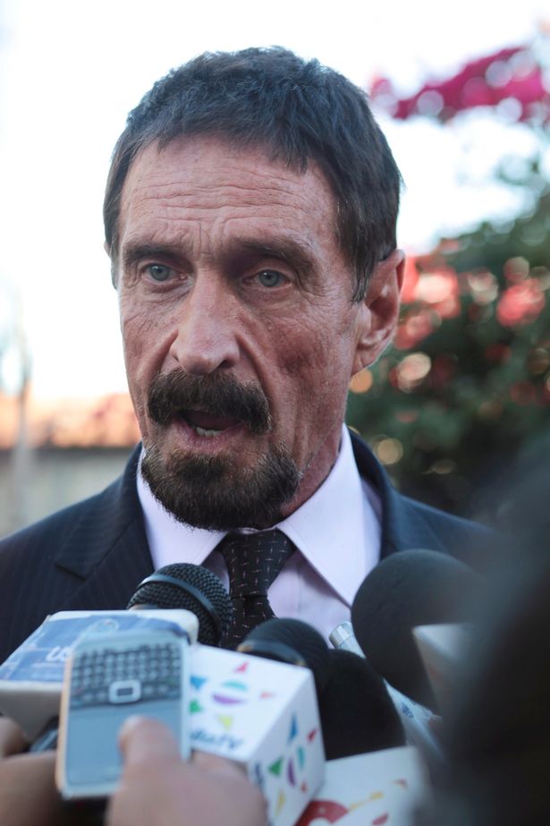 John Mcafee addresses a news conference outside the Supreme Court of Justice in Guatemala City