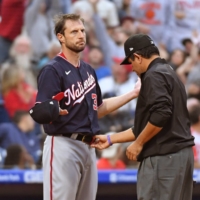 Nationals pitcher Max Scherzer is checked for foreign substances on Tuesday in Philadelphia. | USA TODAY / VIA REUTERS