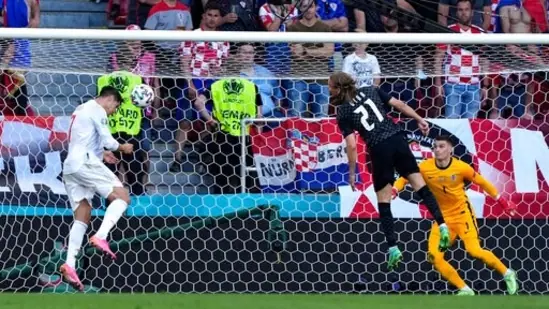 Alvaro Morata had one of the best chances to open the scoring when he got to the end of a Ferran Torres cross. However, he mistimed the header completely and really did not score from this angle. (AP)