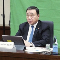 Trade minister Hiroshi Kajiyama takes part in an online meeting of the Asia-Pacific Economic Cooperation forum on Saturday. | KYODO