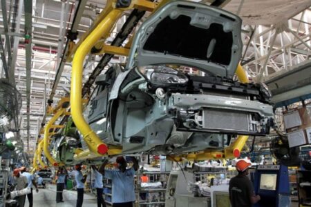 Automakers in ‘India’s Detroit’ allowed to operate as workers protest COVID risk