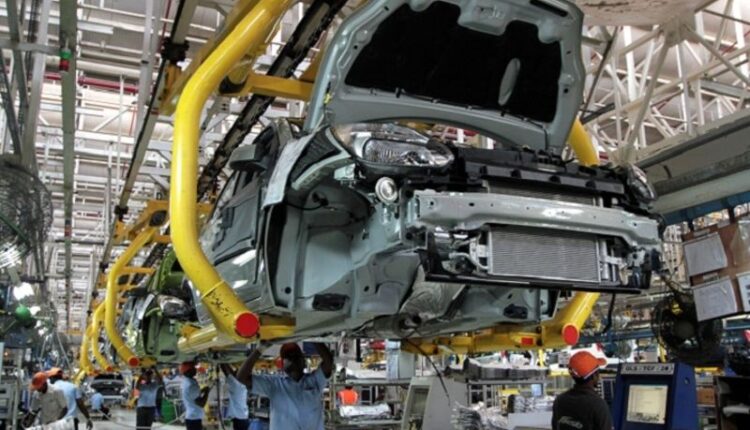 Automakers in 'India's Detroit' allowed to operate as workers protest COVID risk