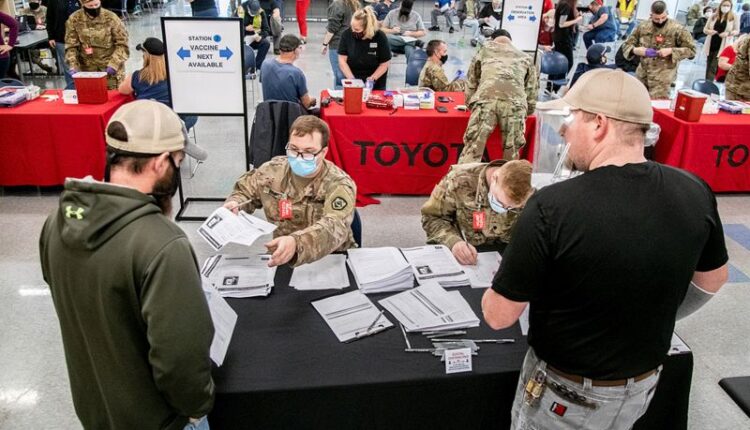 Automakers' mask requirements for vaccinated workers begin to drop