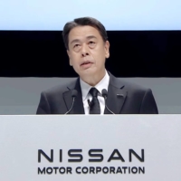 Nissan Motor Co. CEO Makoto Uchida speaks at the company's annual shareholders meeting on Tuesday. | NISSAN MOTOR CO. / VIA KYODO