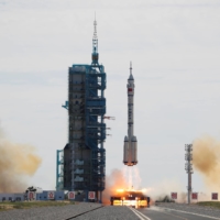 The Shenzhou-12 spacecraft, carrying three astronauts, takes off from the Jiuquan Satellite Launch Center in Gansu province, China, on Thursday.  | REUTERS