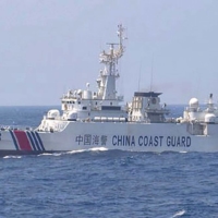 A Chinese coast guard ship near the Senkaku Islands earlier this year.  | JAPAN COAST GUARD / VIA KYODO