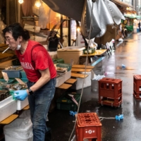 Japan's business sentiment diffusion index dropped 0.8 point from April to 37.5, partly reflecting the extension and expansion of the government's third COVID-19 state of emergency, according to the Teikoku Databank Ltd. survey. | AFP-JIJI