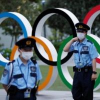 The central government is considering placing Tokyo under a quasi-state of emergency during the Olympics, after a number of health experts expressed concerns over a potential spike in COVID-19 cases. | REUTERS