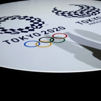 The emblems of the Tokyo 2020 Olympic and Paralympic Games are displayed during an unveiling event for the items that will be used for the victory ceremonies, at Ariake Arena in Tokyo on Thursday. | POOL / VIA REUTERS