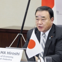 Economy minister Hiroshi Kajiyama attends a meeting with ASEAN ministers on Monday.  | METI / VIA KYODO